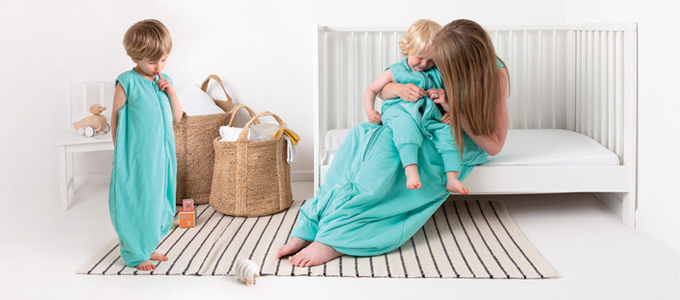 mum with toddler and baby wearing slumbersacs