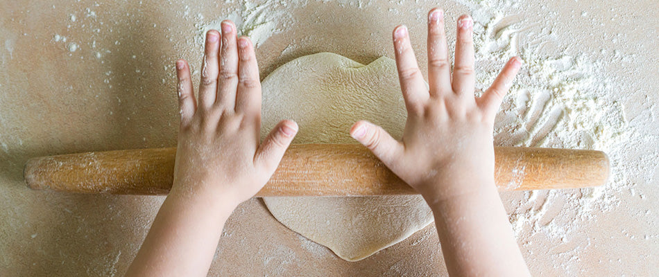 hands rolling pastry