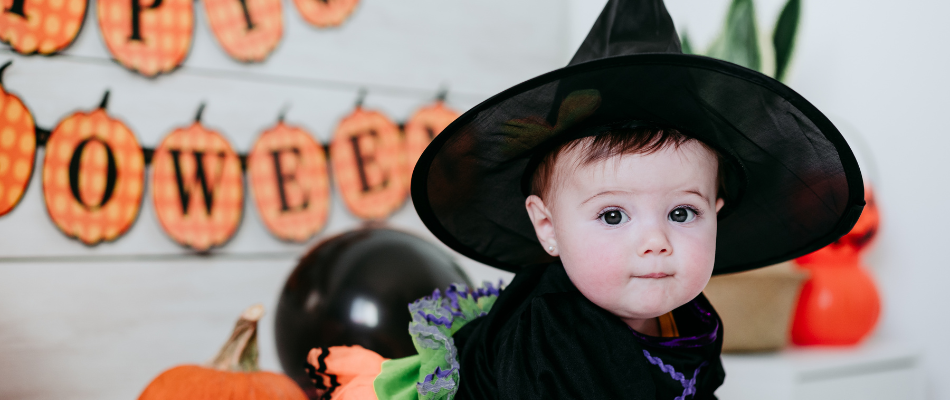 baby in witches costume