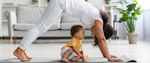 mum doing yoga with baby