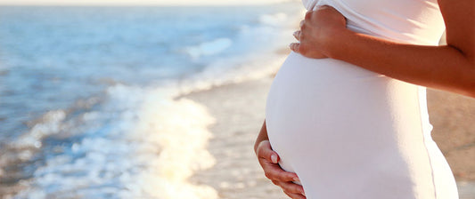 pregnant woman on beach