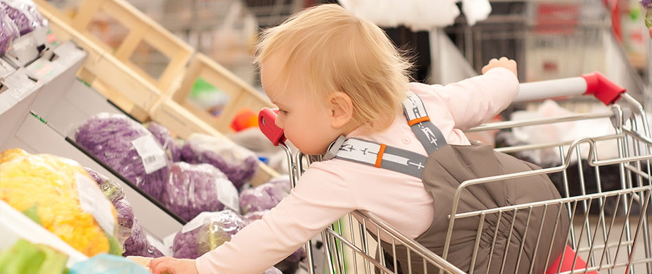 toddler in trolley at supermarket