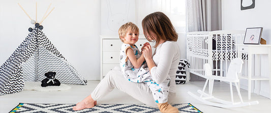 toddler in nursery with mum