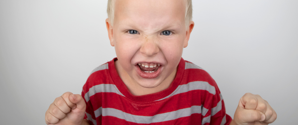 boy in red and white striped top